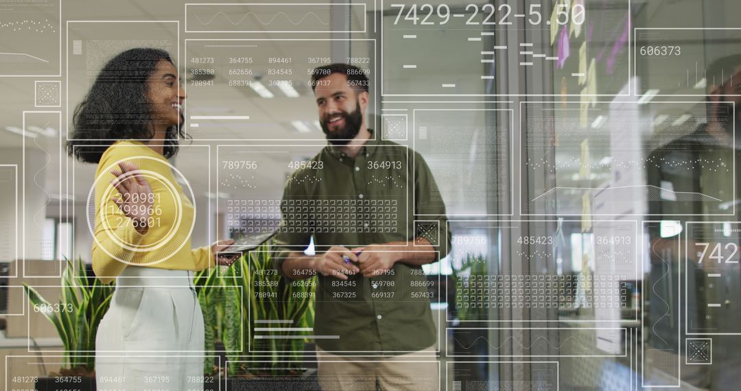 Business Colleagues Analyzing Digital Financial Data in Office