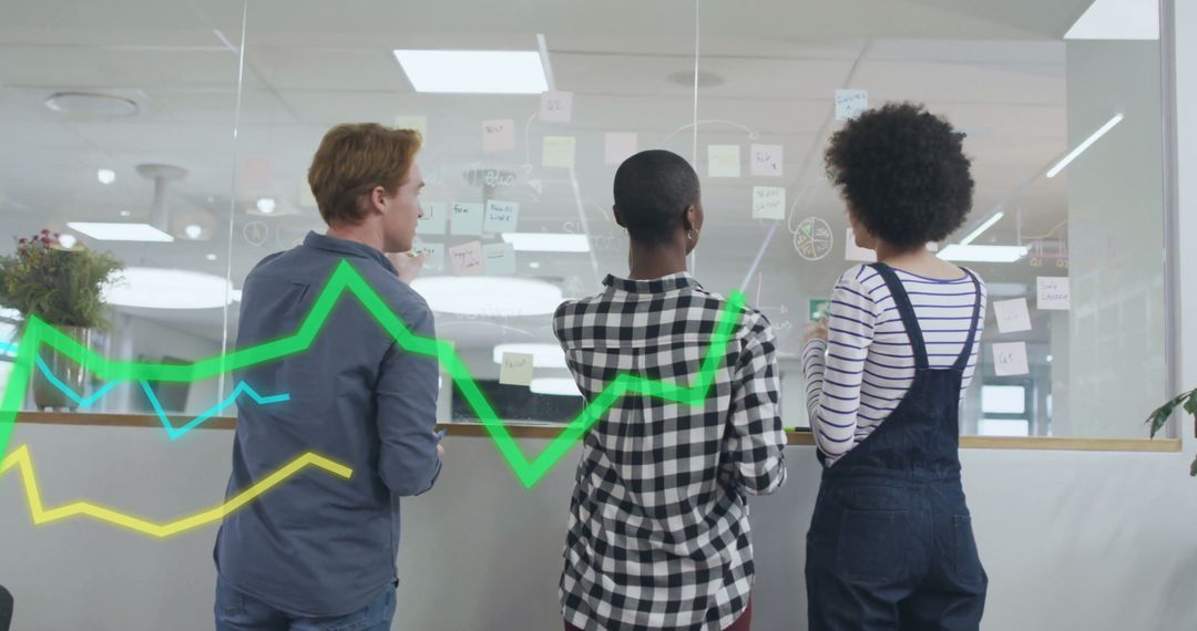 Team Collaborating on Innovative Business Solutions in Modern Office