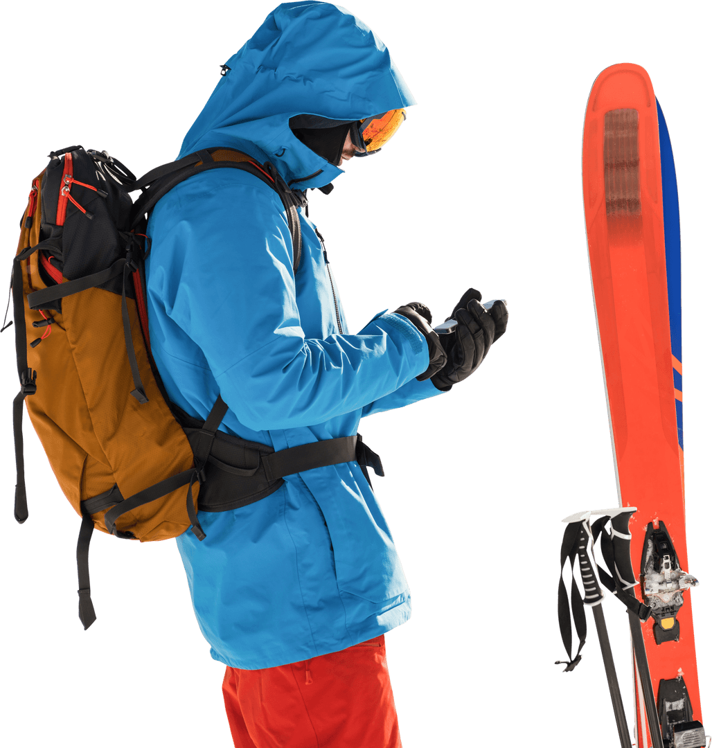 Skier in Blue Jacket Using Mobile Phone with Orange Backpack and Red Skis