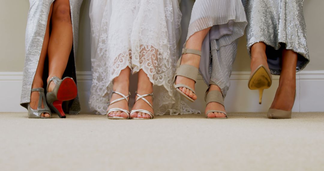 Bride and bridesmaids show off their shoes at room 4K 4k - Free Images, Stock Photos and Pictures on Pikwizard.com