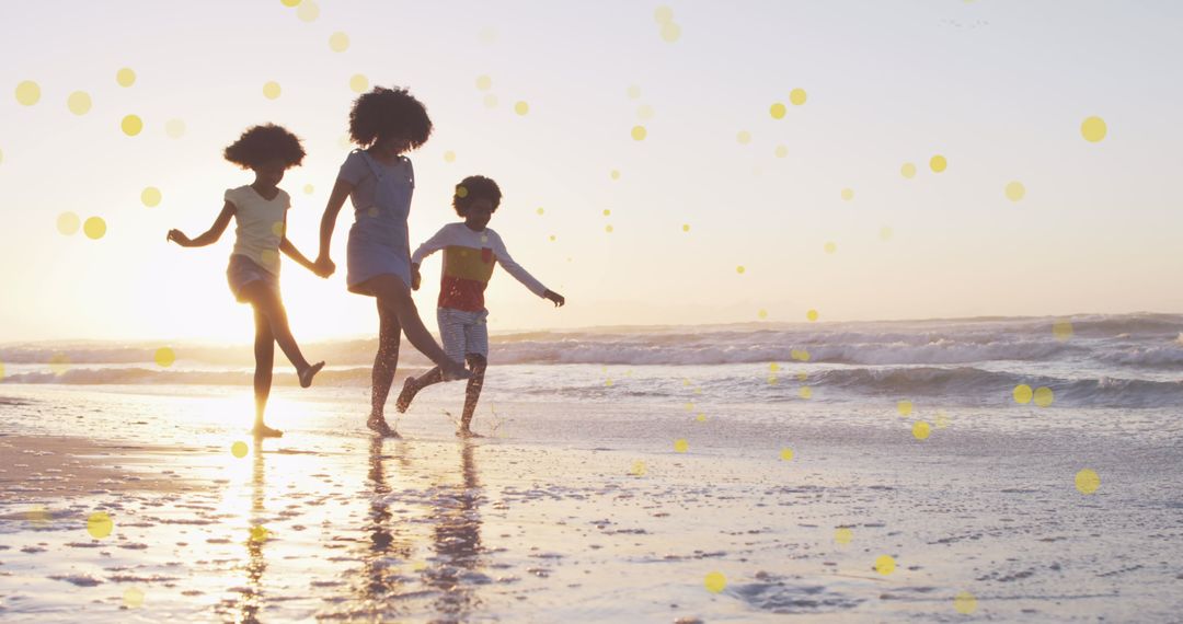 Joyful Family Running on Beach at Sunset