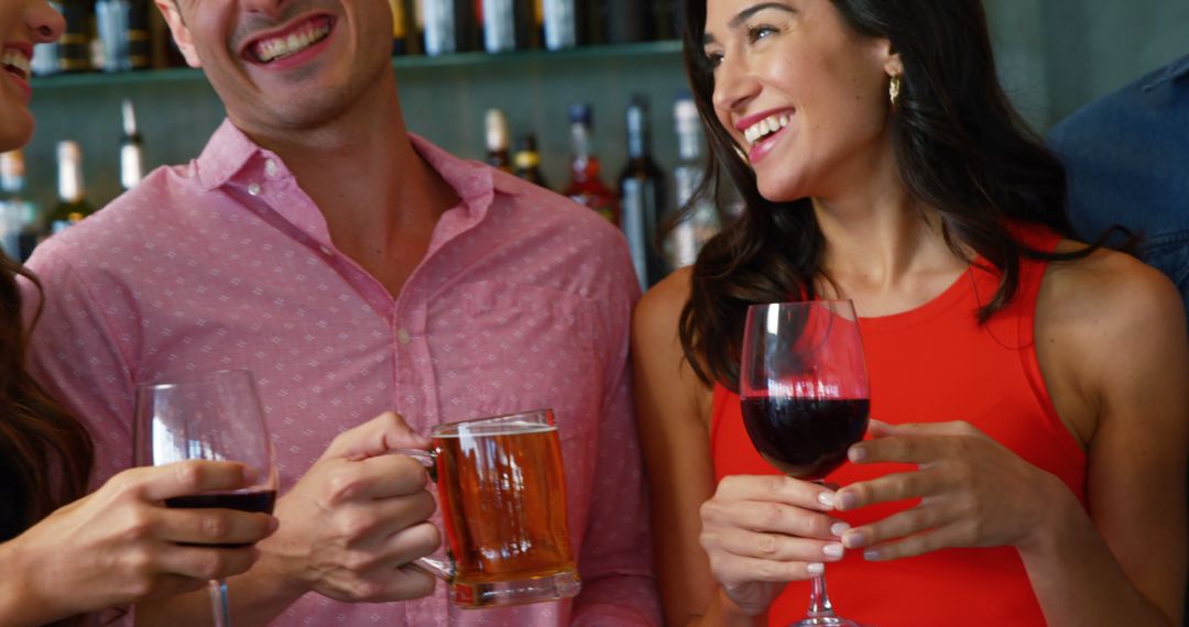 Friends Enjoying Drinks and Socializing in Modern Bar