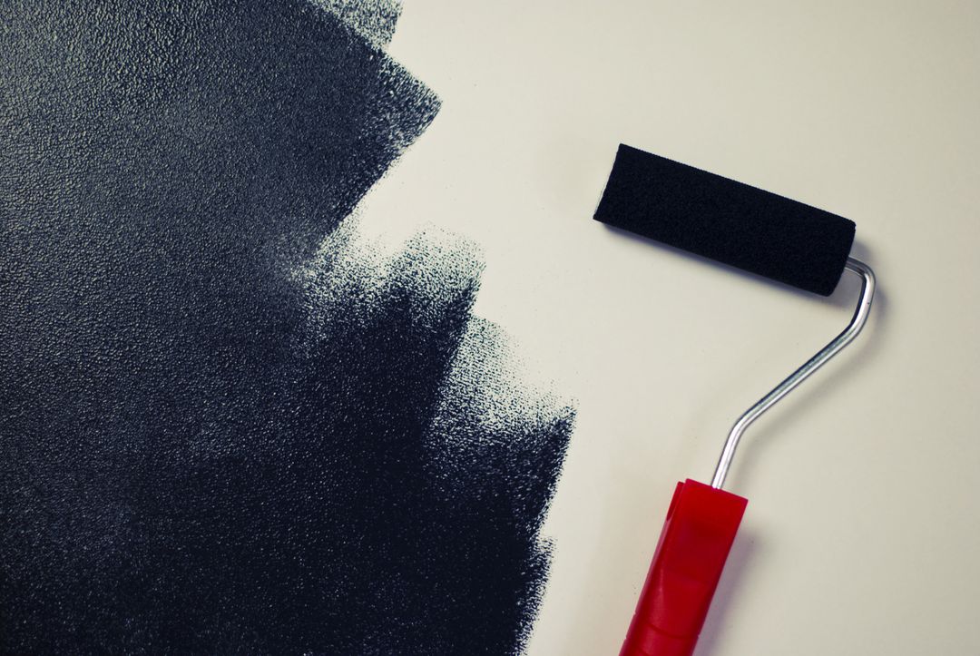 Black paint roller painting - Free Images, Stock Photos and Pictures on Pikwizard.com