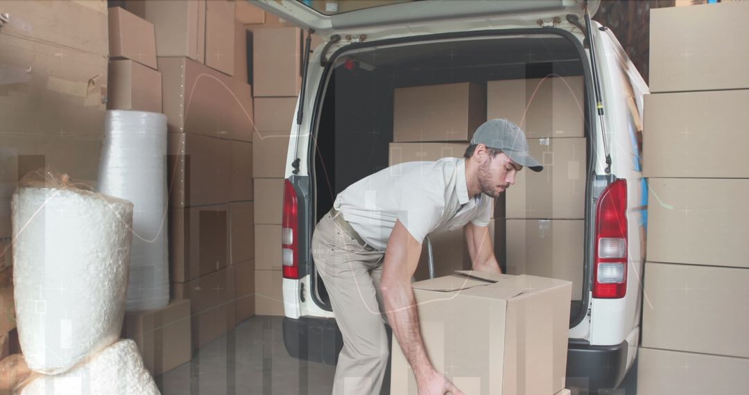 Man Loading Van with Cardboard Boxes for Global Shipping