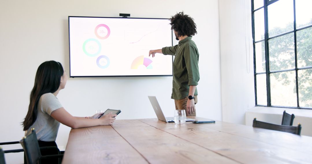 Creative Business Team Analyzing Data in Modern Office Setting
