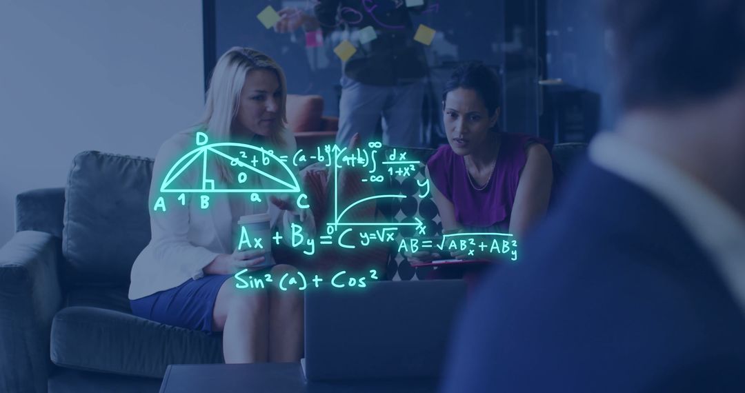 Female Colleagues Collaborating with Mathematical Overlay in Office