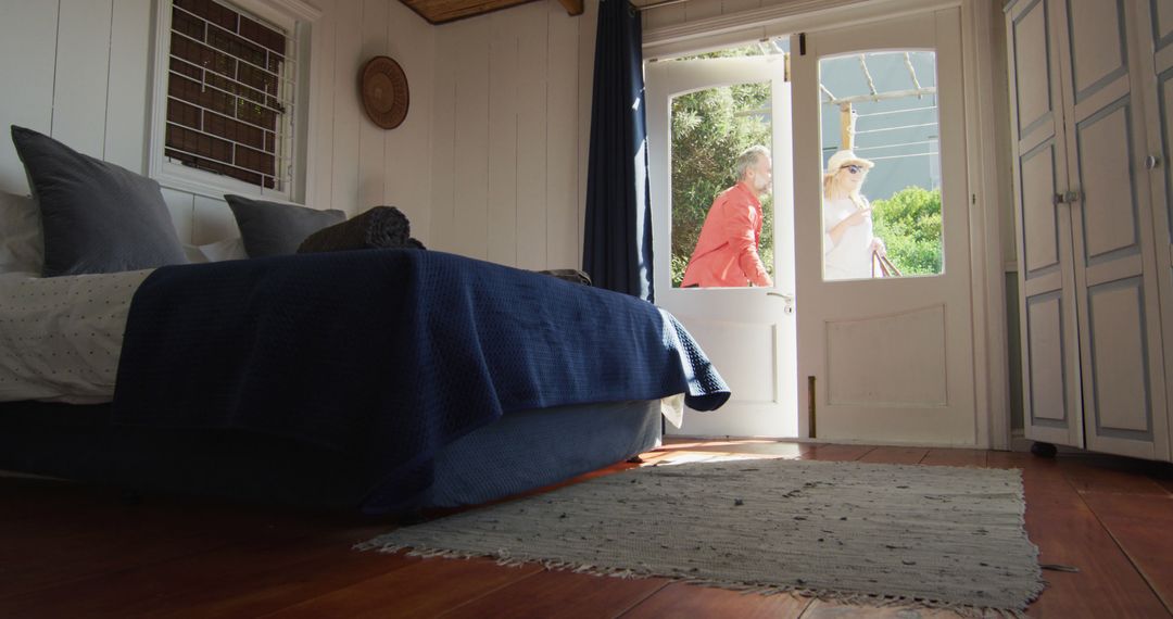 Bright Cottage Bedroom with Sunlight and French Doors - Free Images, Stock Photos and Pictures on Pikwizard.com