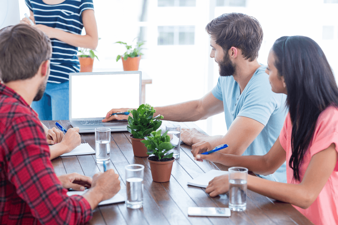 Collaborative Business Meeting with Transparent Laptop Screen