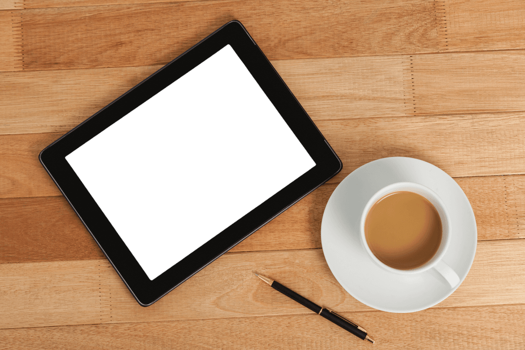 Digital Tablet on Wooden Table with Cup of Tea and Pen - Transparent Background