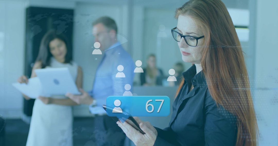 Red-Haired Woman Using Tablet in Digital Office Environment
