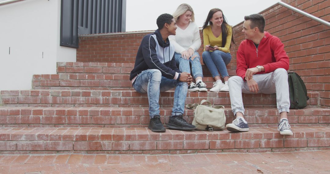 Group of Diverse Friends Chatting on Brick Steps - Free Images, Stock Photos and Pictures on Pikwizard.com