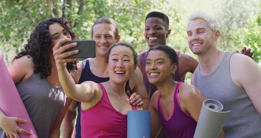 Diverse Group of Friends Taking Selfie with Yoga Mats in Nature - Free Images, Stock Photos and Pictures on Pikwizard.com