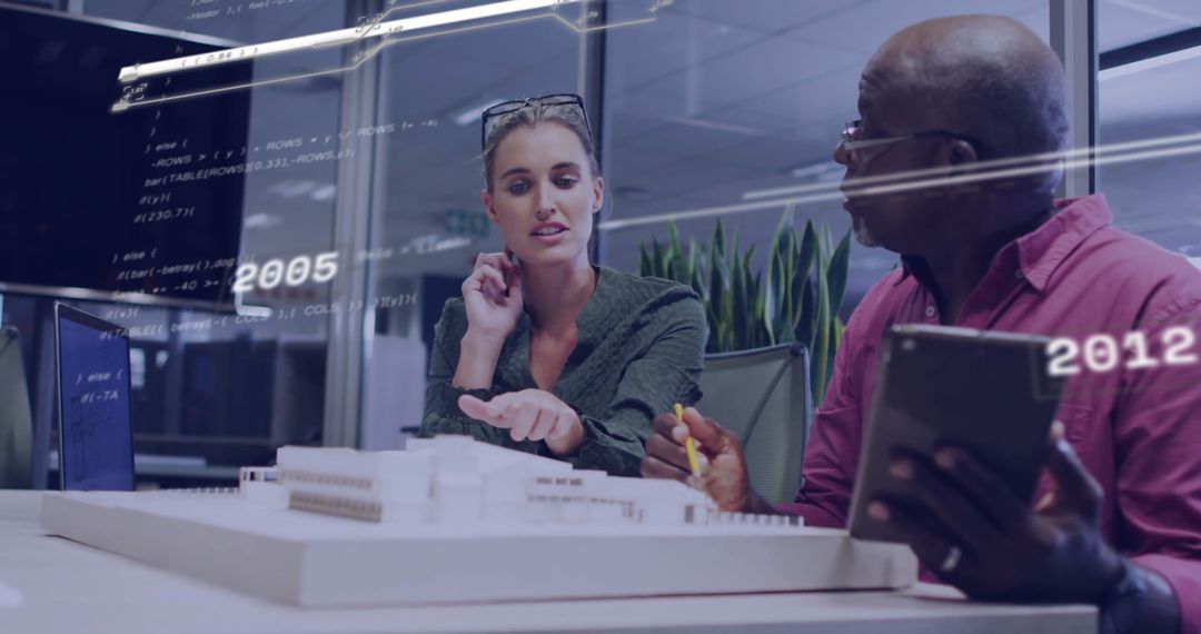 Diverse Team Analyzing Digital Architecture Project