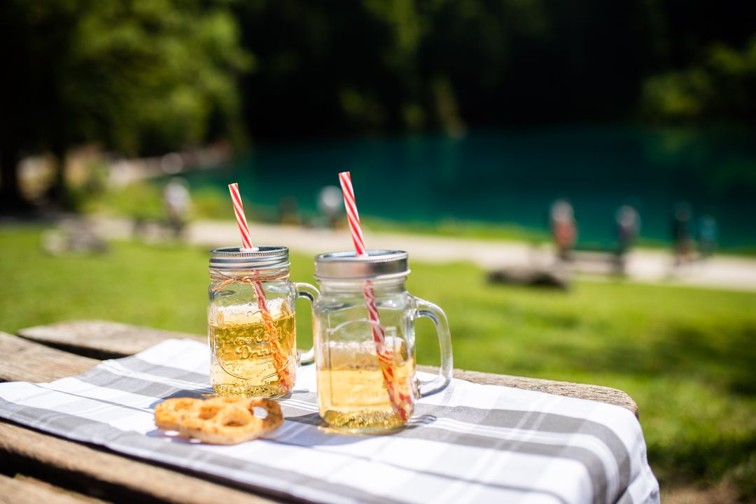 Refreshing Lemonade in Mason Jars by Tranquil Lakeside