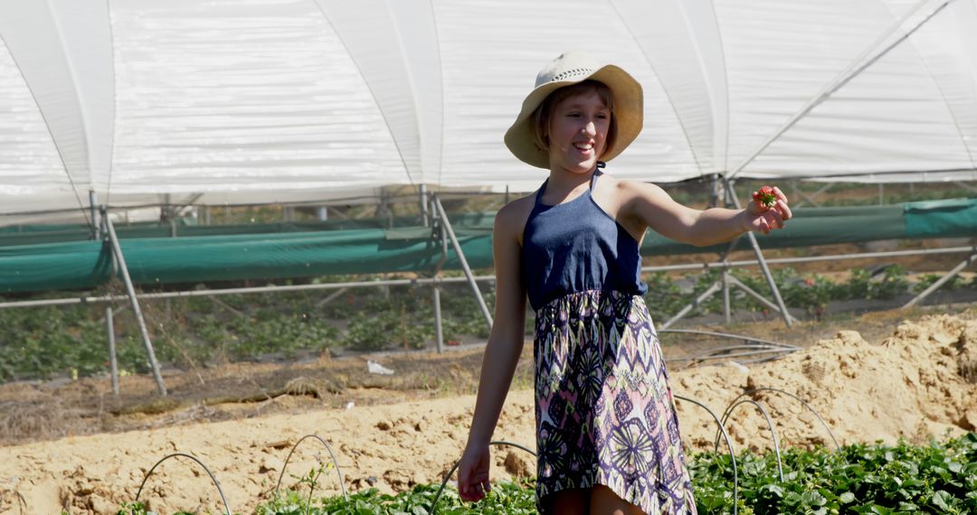 Young Girl Harvesting Strawberries at Farm - Free Images, Stock Photos and Pictures on Pikwizard.com