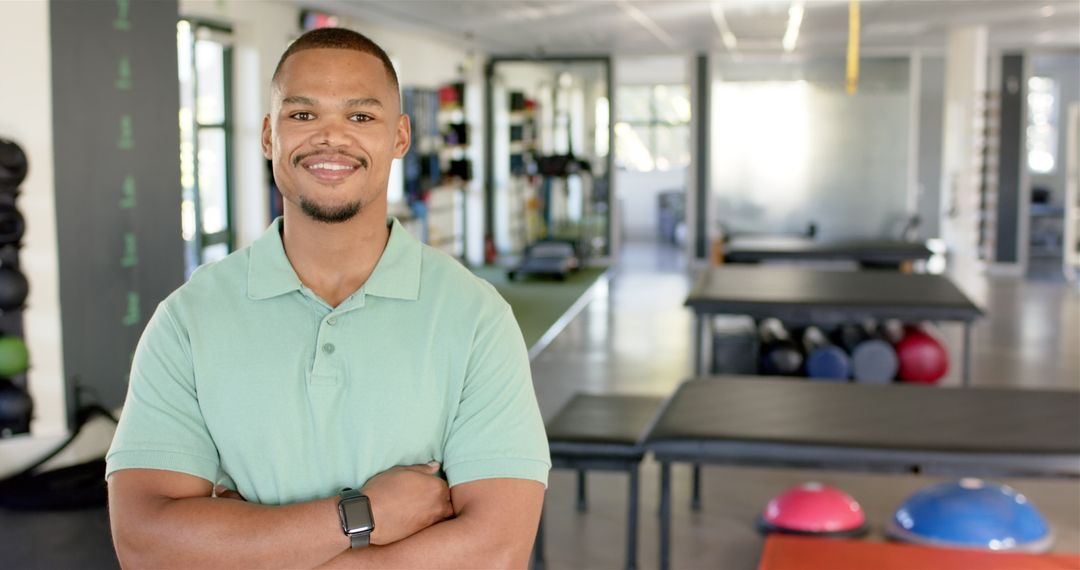 Confident Man in Rehabilitation Center Embracing Technology