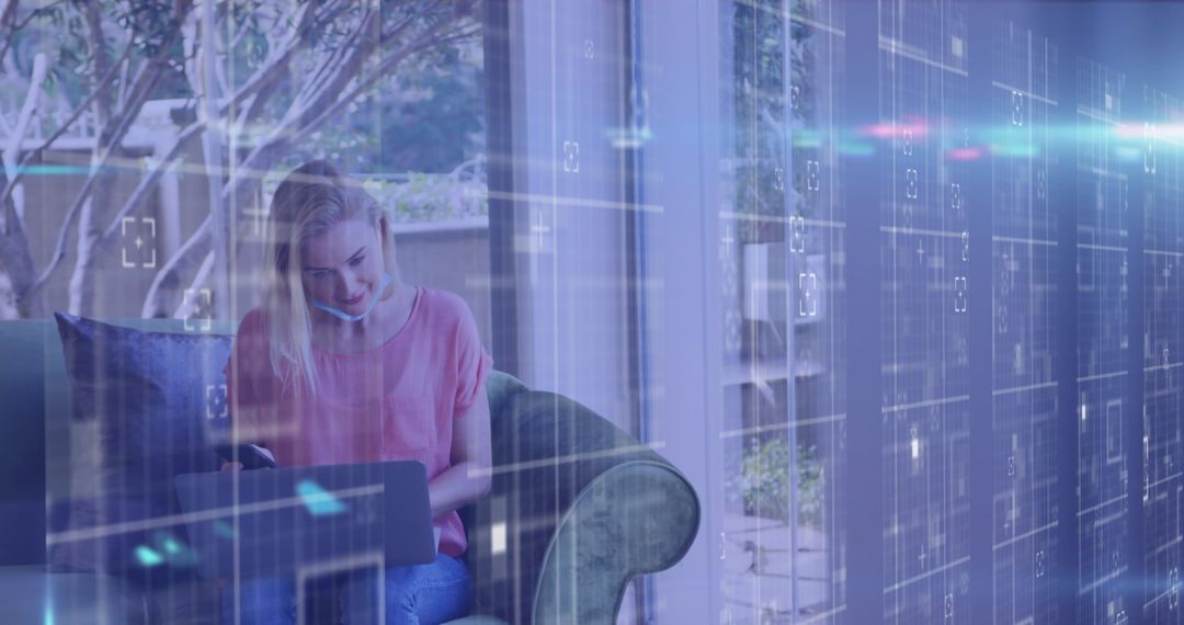 Woman Wearing Face Mask Working Remotely with Digital Data Overlay