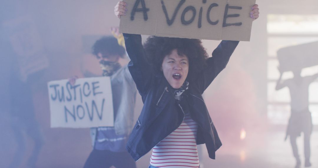 Group of Young Activists Protesting for Justice with Signs - Free Images, Stock Photos and Pictures on Pikwizard.com