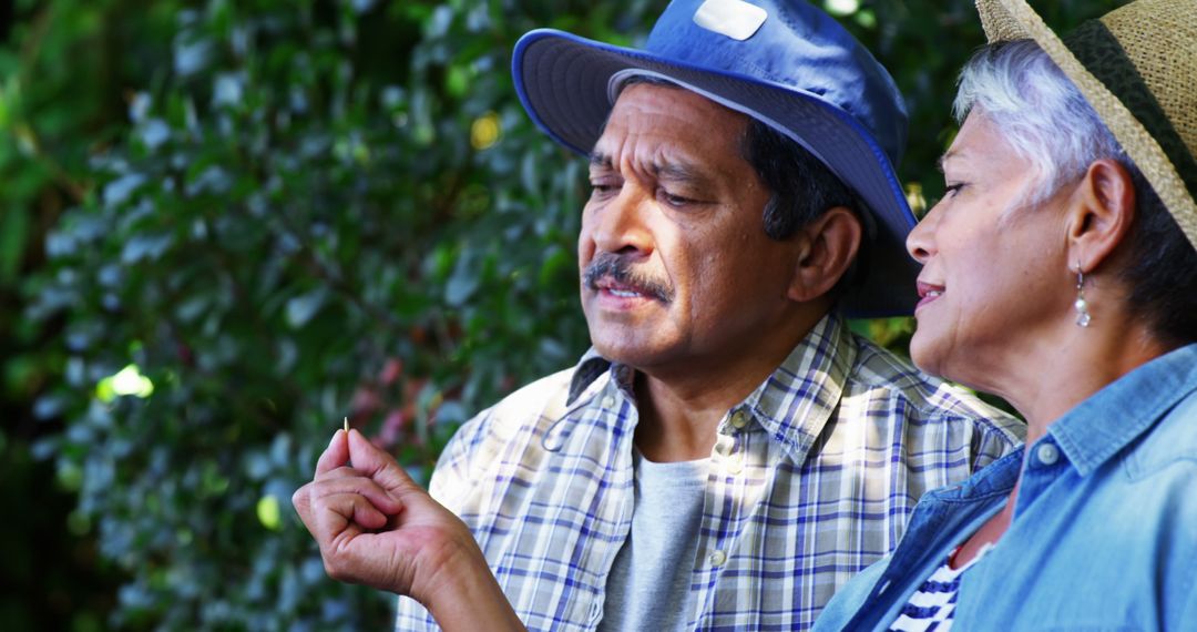 Middle-aged Latino Couple Relaxing in Nature Enjoying Tranquil Moment