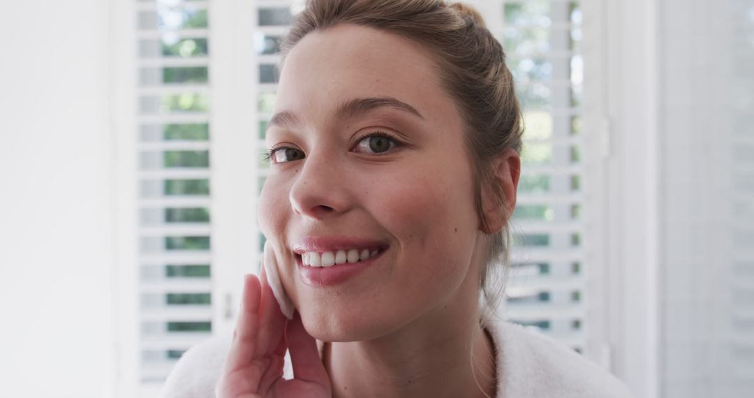 Smiling Woman Enjoying Skincare Routine Natural Beauty - Free Images, Stock Photos and Pictures on Pikwizard.com