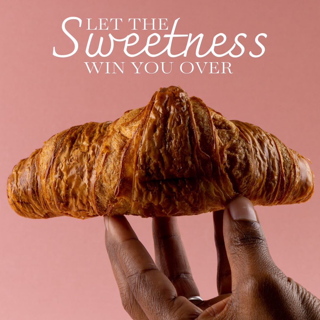 Hand Holding Fresh Croissant With Let The Sweetness Win You Over Text - Download Free Stock Templates Pikwizard.com