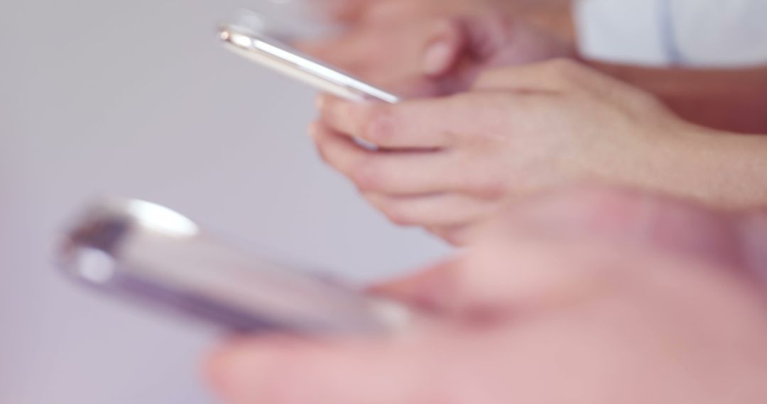 Close-up of Hands Holding Smartphones in Social Interaction - Free Images, Stock Photos and Pictures on Pikwizard.com