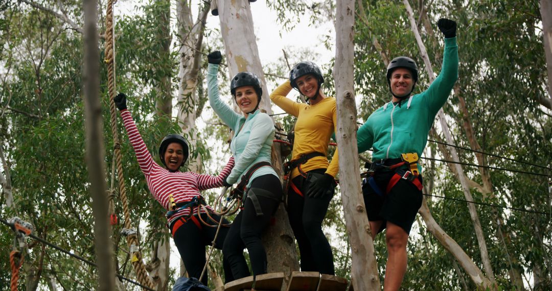 Group of Friends Enjoying Zip Line Adventure in Forest - Free Images, Stock Photos and Pictures on Pikwizard.com