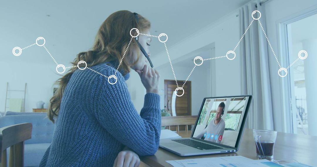 Woman Engaging in Virtual Meeting with Data Visualization Overlay