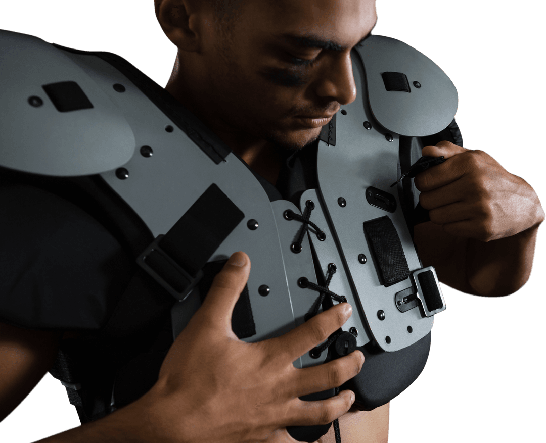 American Football Player Adjusting Transparent Shoulder Pad