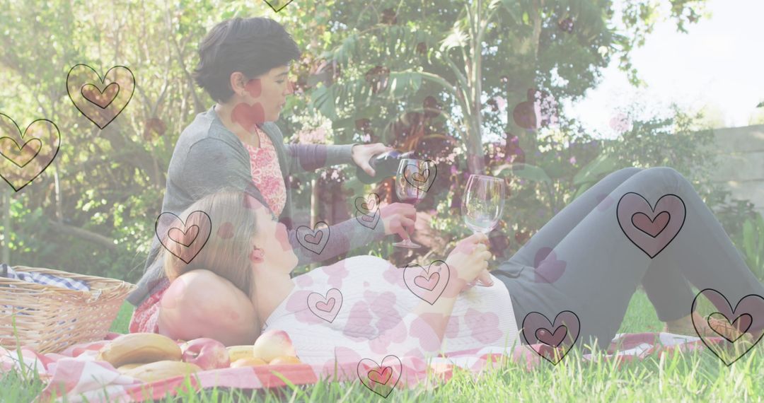 Couple Enjoying Wine in Romantic Picnic Setting