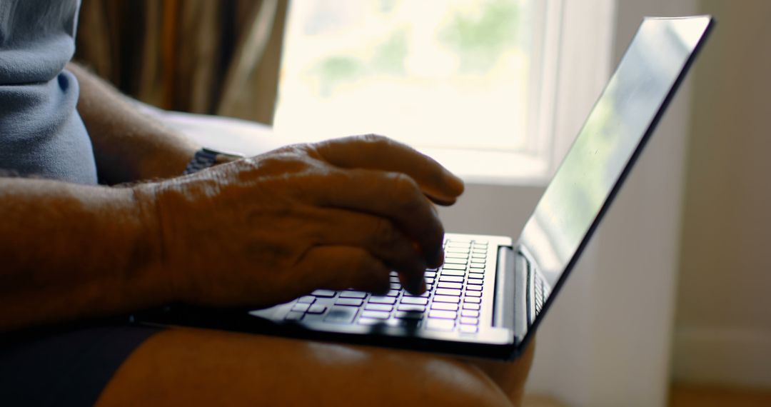 Senior Person Typing on Laptop at Home - Free Images, Stock Photos and Pictures on Pikwizard.com