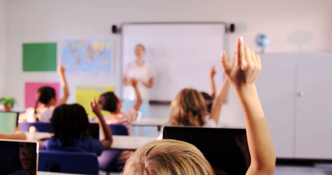 Students Raising Hands in Classroom with Teacher Presenting - Free Images, Stock Photos and Pictures on Pikwizard.com