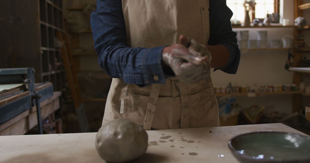 Close-up of Potter Shaping Clay in Studio - Free Images, Stock Photos and Pictures on Pikwizard.com