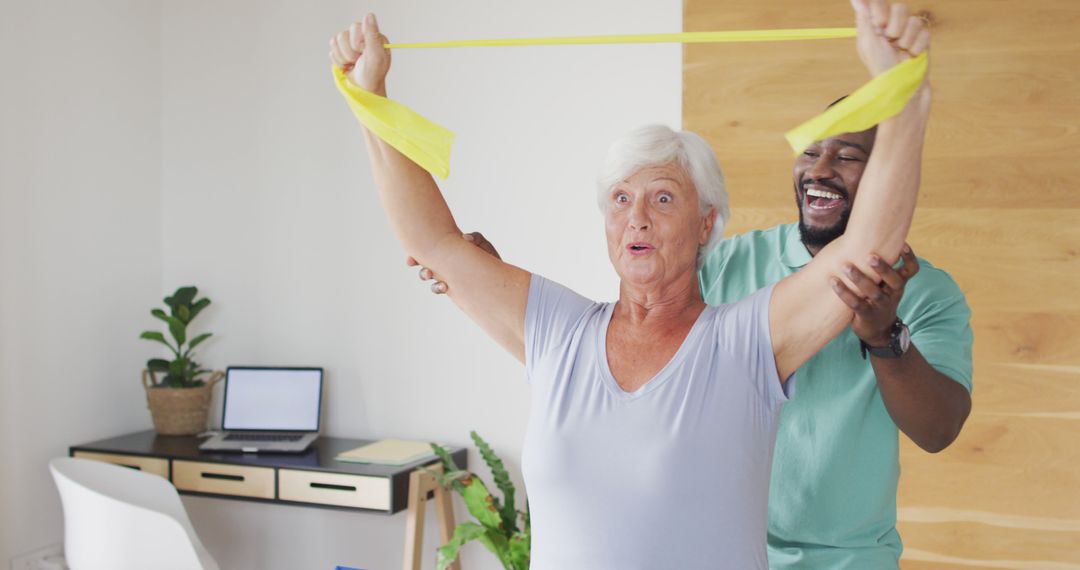 Senior Woman Exercising with Therapist at Home - Free Images, Stock Photos and Pictures on Pikwizard.com