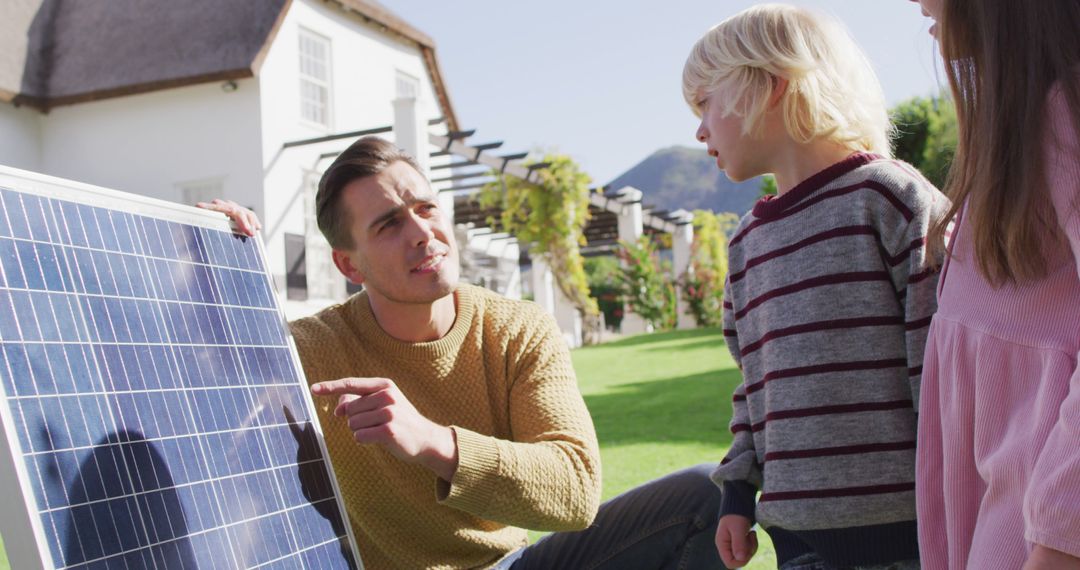 Father Teaching Children About Solar Panel Outdoors - Free Images, Stock Photos and Pictures on Pikwizard.com