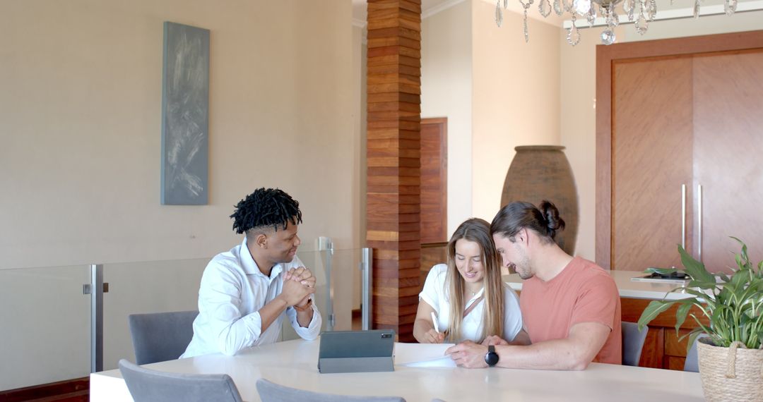 Diverse Team Collaborating in Modern Office with Document Review