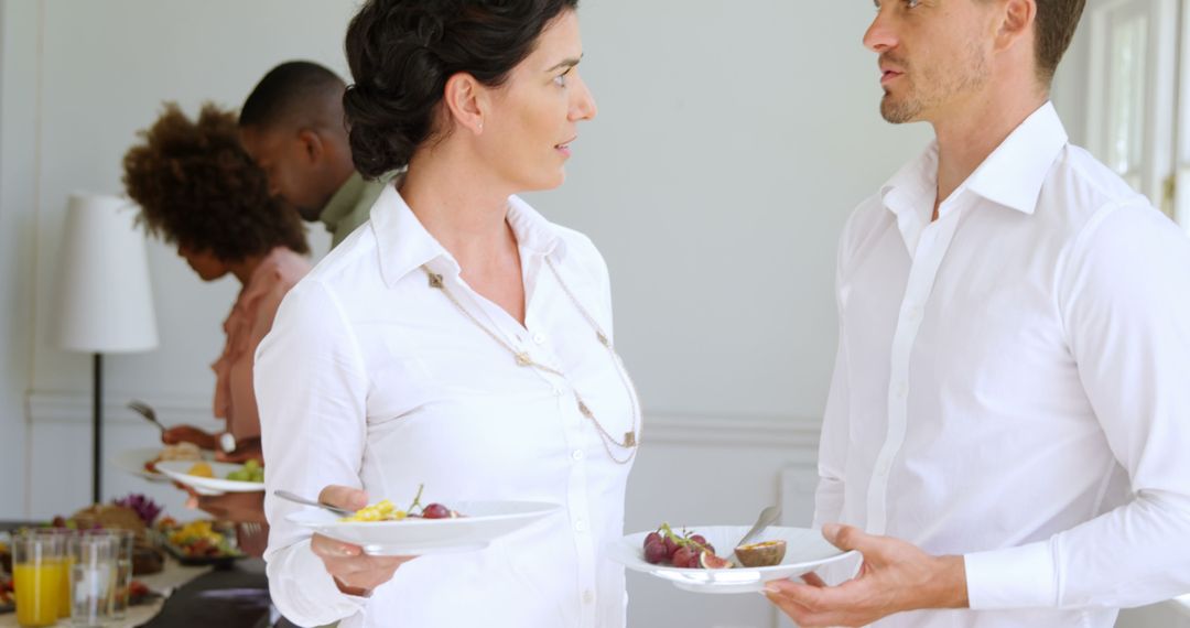 Colleagues Conversing at Business Lunch Event