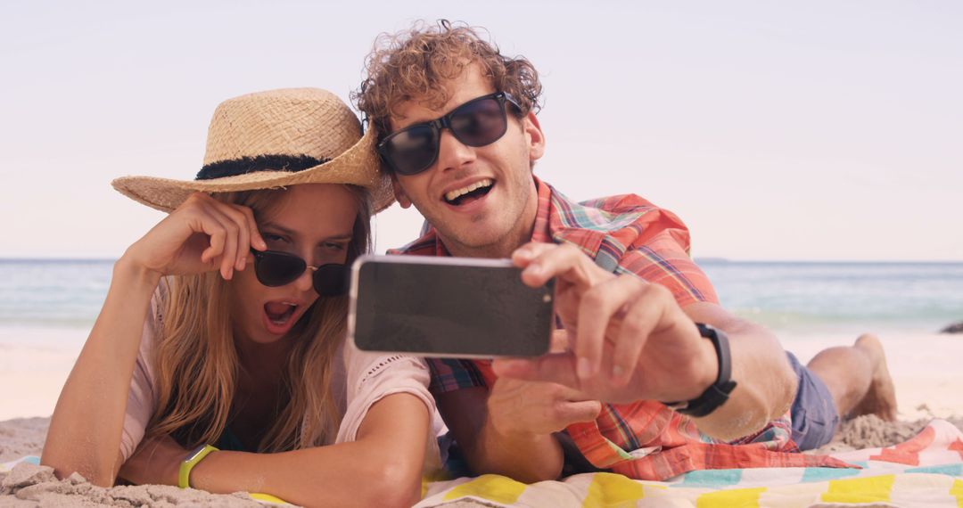 Young Couple Taking Selfie on Beach Vacation - Free Images, Stock Photos and Pictures on Pikwizard.com