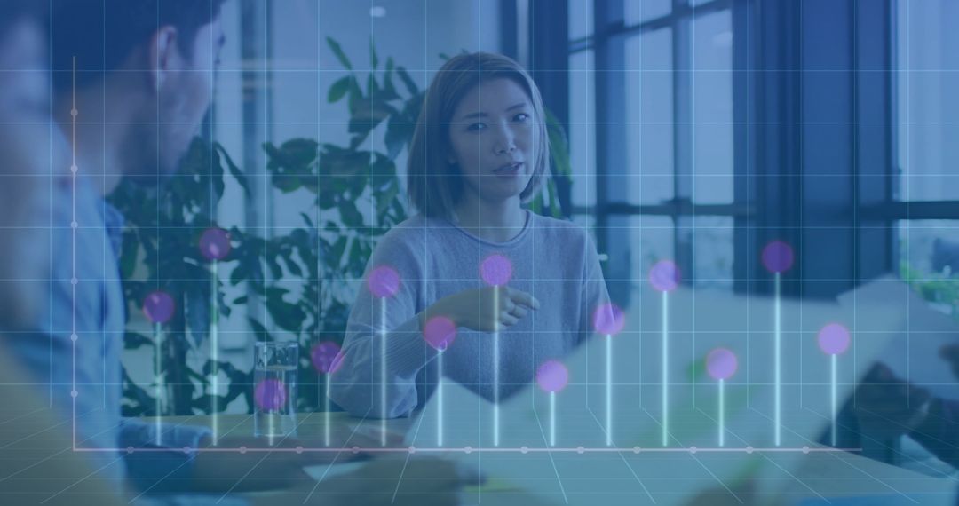 Financial Advisors Analyzing Data with Overlaid Graph Elements