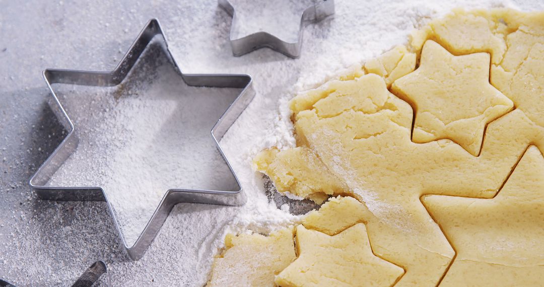 Star-shaped Cookie Cutters and Dough on Floured Surface - Free Images, Stock Photos and Pictures on Pikwizard.com