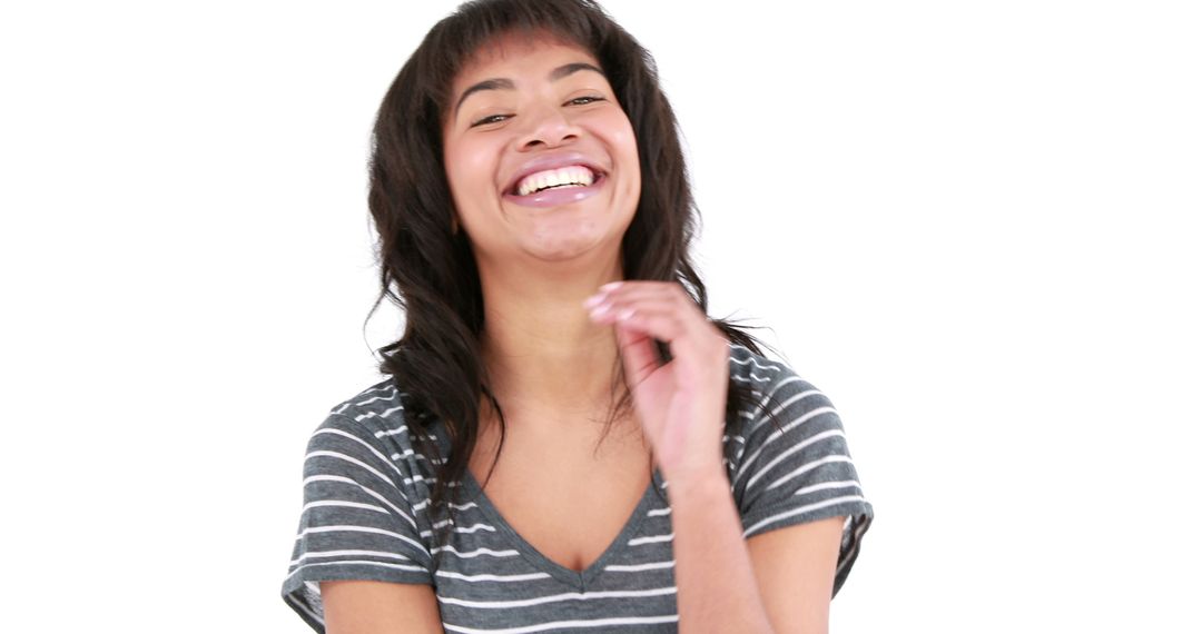 Young Woman Laughing with Hand Raised - Free Images, Stock Photos and Pictures on Pikwizard.com