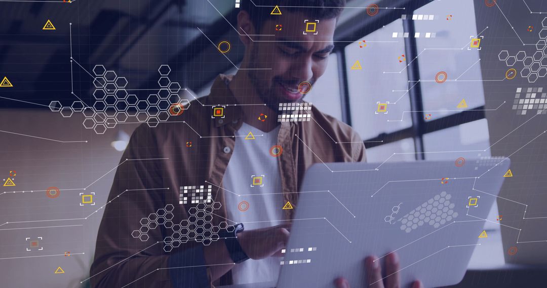 Tech Professional Analyzing Data on Laptop in Futuristic Office