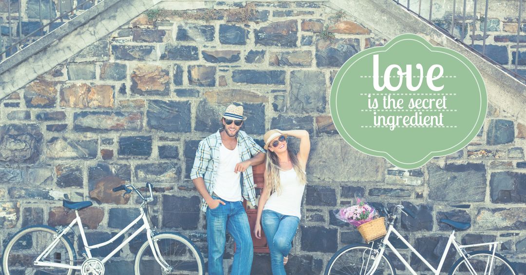 Romantic Couple with Bicycles by Stone Wall