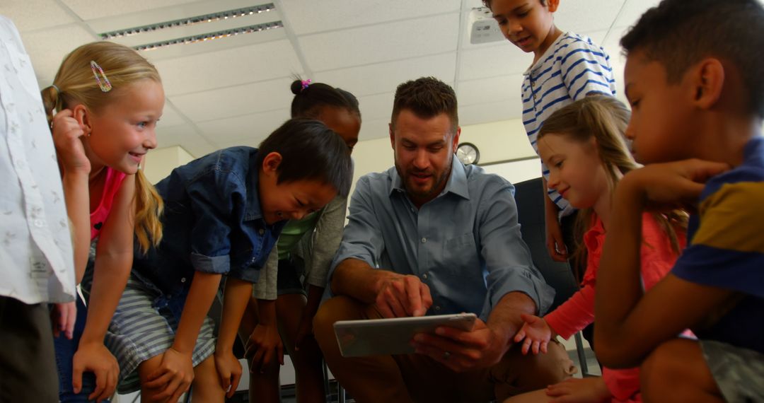 Engaged Students Learning with Teacher Using Digital Tablet
