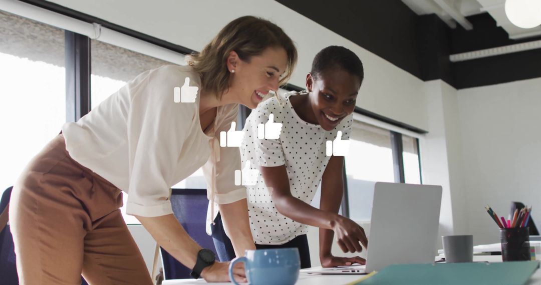Diverse Female Colleagues Engaged in Dynamic Office Discussion