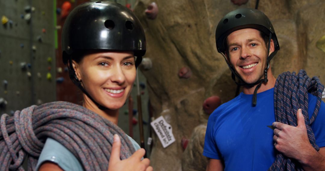 Smiling Climbers with Ropes Ready for Indoor Rock Climbing - Free Images, Stock Photos and Pictures on Pikwizard.com