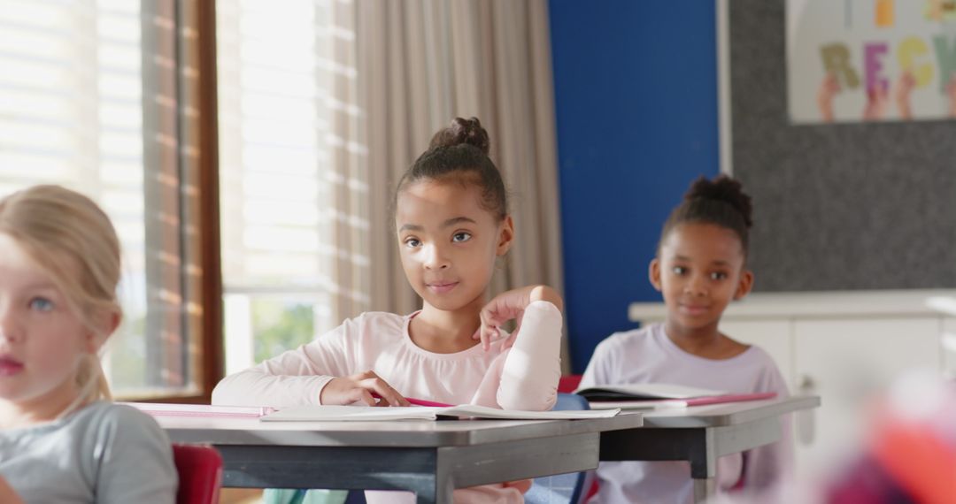 Attentive Schoolgirls Engaging in Classroom Activity