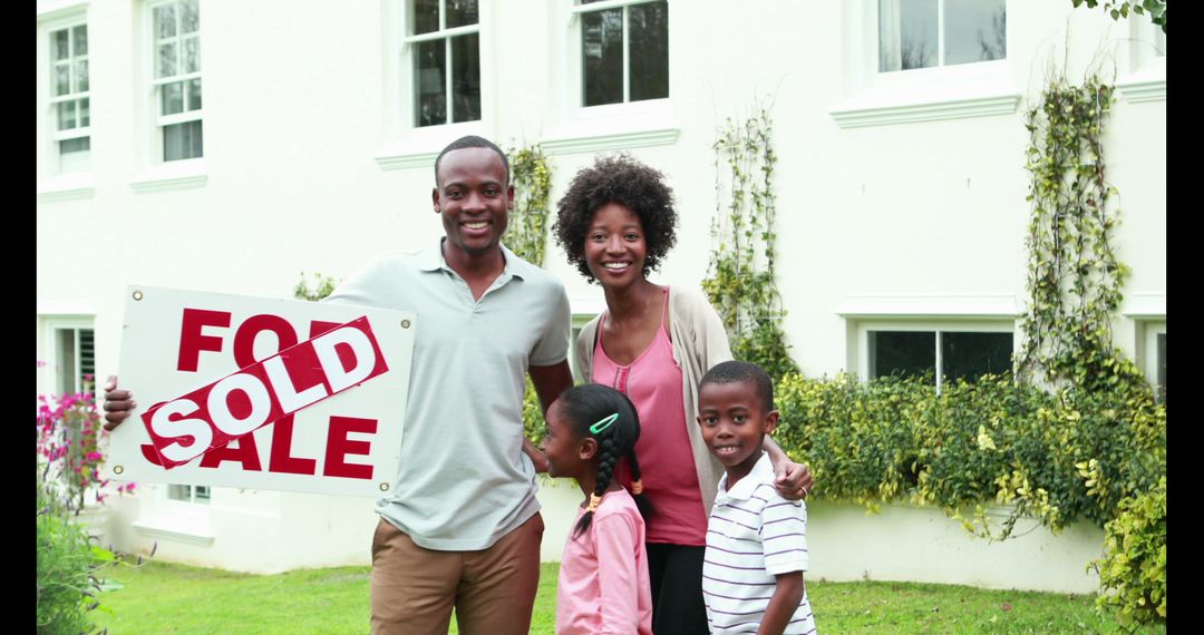 Happy African-American Family Celebrating Home Purchase with Sold Sign - Free Images, Stock Photos and Pictures on Pikwizard.com