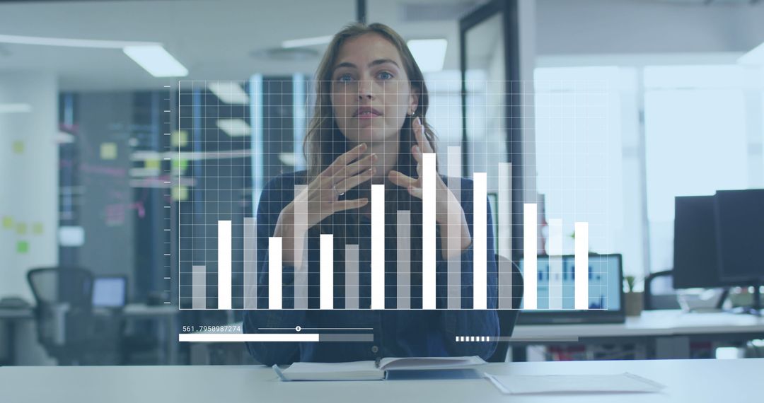 Businesswoman Analyzing Data with Augmented Reality in Modern Office