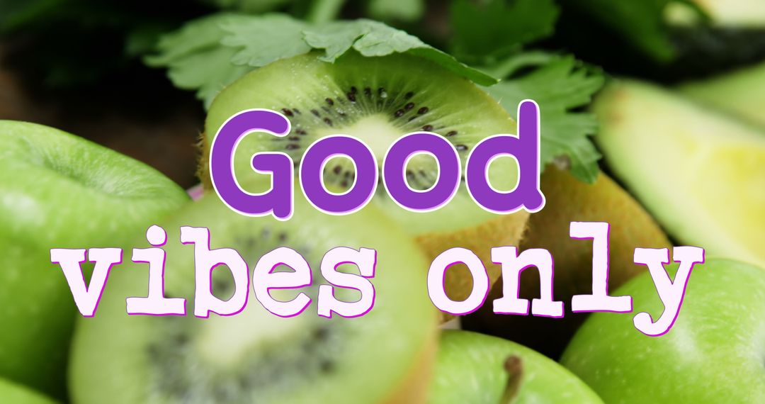 Inspirational Message on Fresh Kiwi and Greens Background